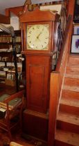 Oak 30 hour grandfather clock with swan neck pediments, hand painted dial, and pendulum and weight