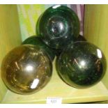 Five green glass net floats