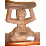 Tribal Art: African carved wood figurative chief's headrest, 8" high