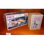 Pinto Johan Torrid Little Funny Car model kit in box, and a contemporary tinplate boxed Minnie