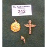 18ct gold St. Christopher, Cornicello charm, and a 10ct totem pole charm. Combined weight approx.