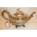 William IV silver teapot with repousse foliate design. Hallmarked for London 1833, maker Robert