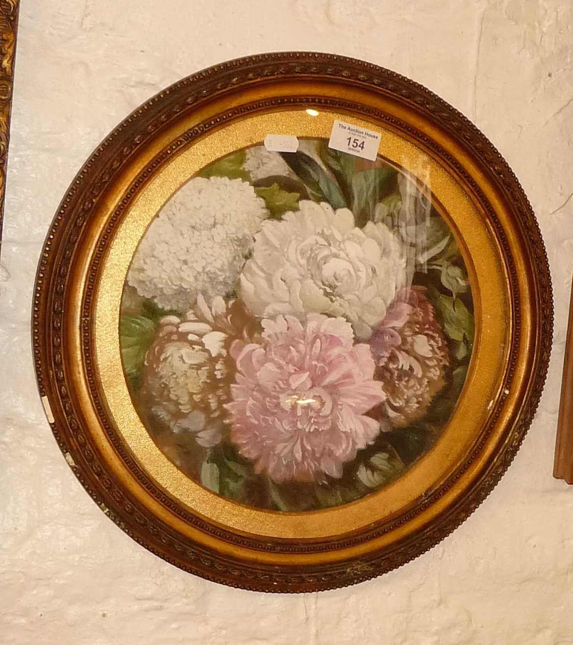 Round gilt frame with watercolour of peonies or chrysanthemums