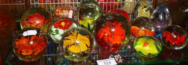 Glass flower paperweights, one resin Hippocampus rose