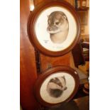 Limited edition prints of an otter and badger by Patrick A. Oxenham, in circular wooden frames