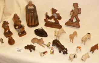Carved wooden Anri figures and toy animals