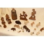 Carved wooden Anri figures and toy animals