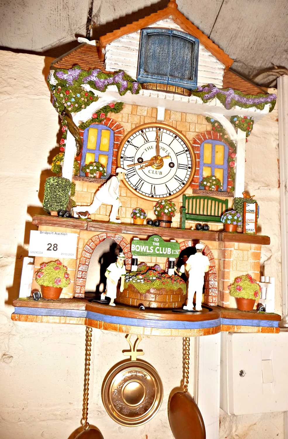 Novelty automaton cuckoo clock "Spirit of Bowls" with moving bowlers from a Bowls Club building