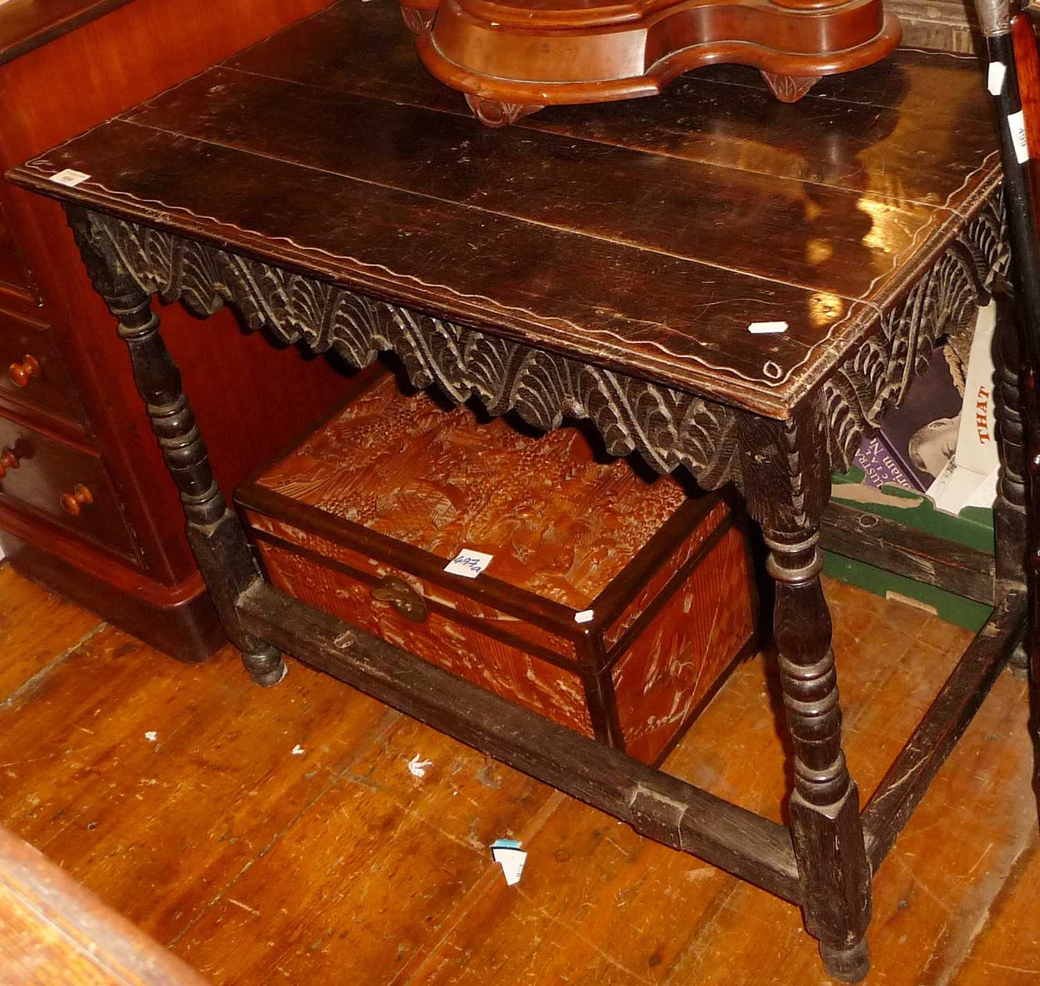 Late 18th c. carved oak side table with carved frieze on turned legs, 35" long x 21" deep