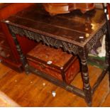 Late 18th c. carved oak side table with carved frieze on turned legs, 35" long x 21" deep