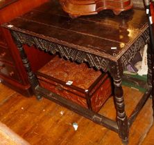 Late 18th c. carved oak side table with carved frieze on turned legs, 35" long x 21" deep