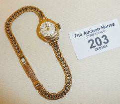 Ladies 9ct gold Bulova watch and bracelet. Total weight 11g