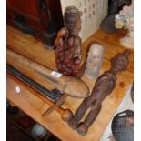 Tribal Art: African two bladed axe, and three various carved wood figures, etc.