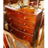 19th c. bow fronted 2 over 3 mahogany chest of drawers. Approx. 104cm high and 107cm wide