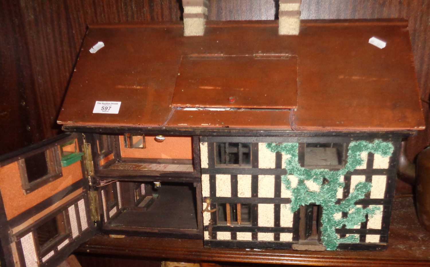 Early 20th c. "Tudor" dolls house with fitted illuminated interior