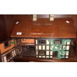 Early 20th c. "Tudor" dolls house with fitted illuminated interior