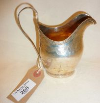 George III finely engraved silver milk jug. Hallmarked for London 1803, maker's mark rubbed, approx.