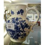 Worcester blue and white jug with floral and butterfly decoration, crescent mark, 15cm tall