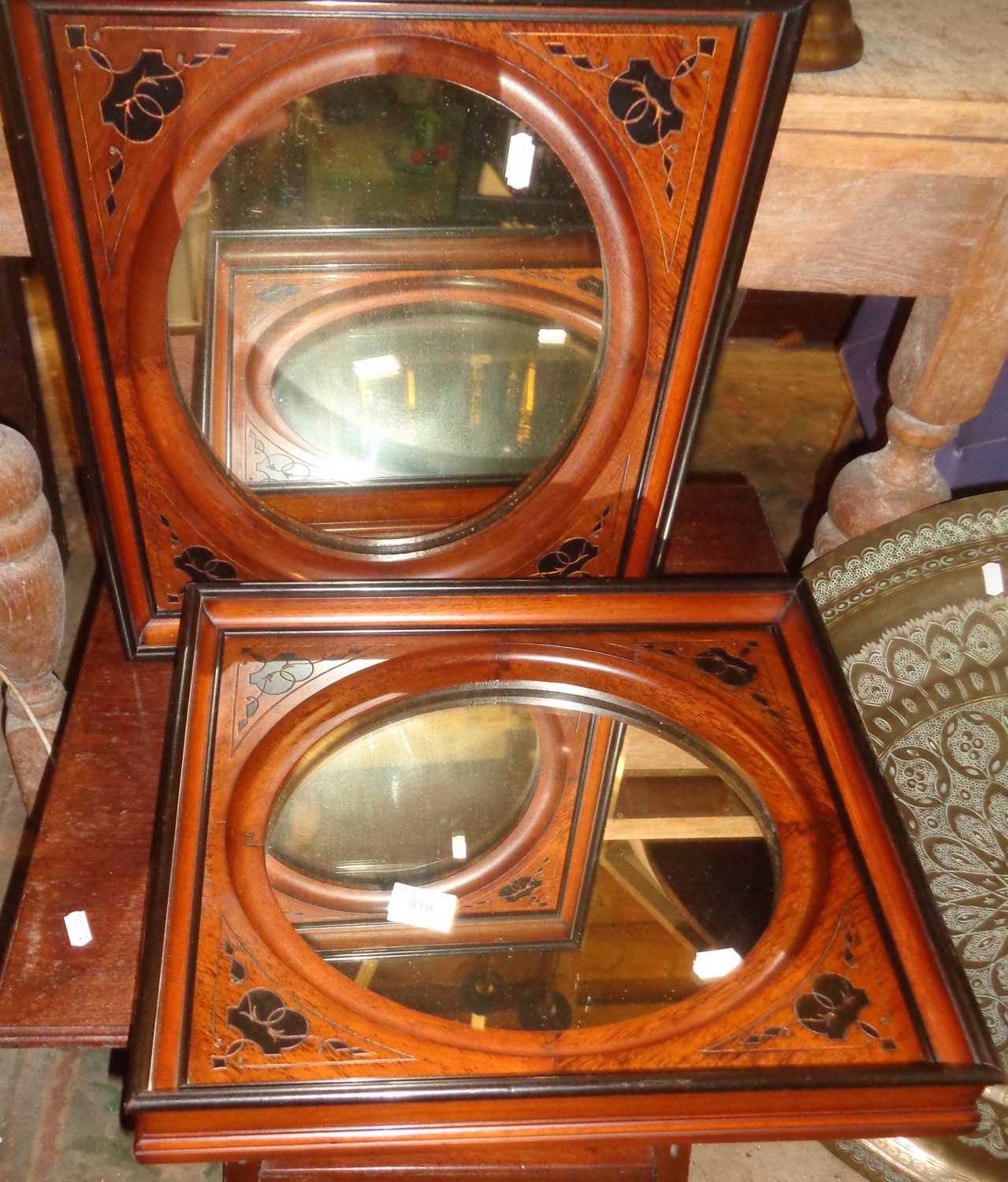 Pair of wall mirrors in wood frames