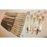 Interesting matched set of Victorian and older silver fiddle pattern table forks. Hallmarks