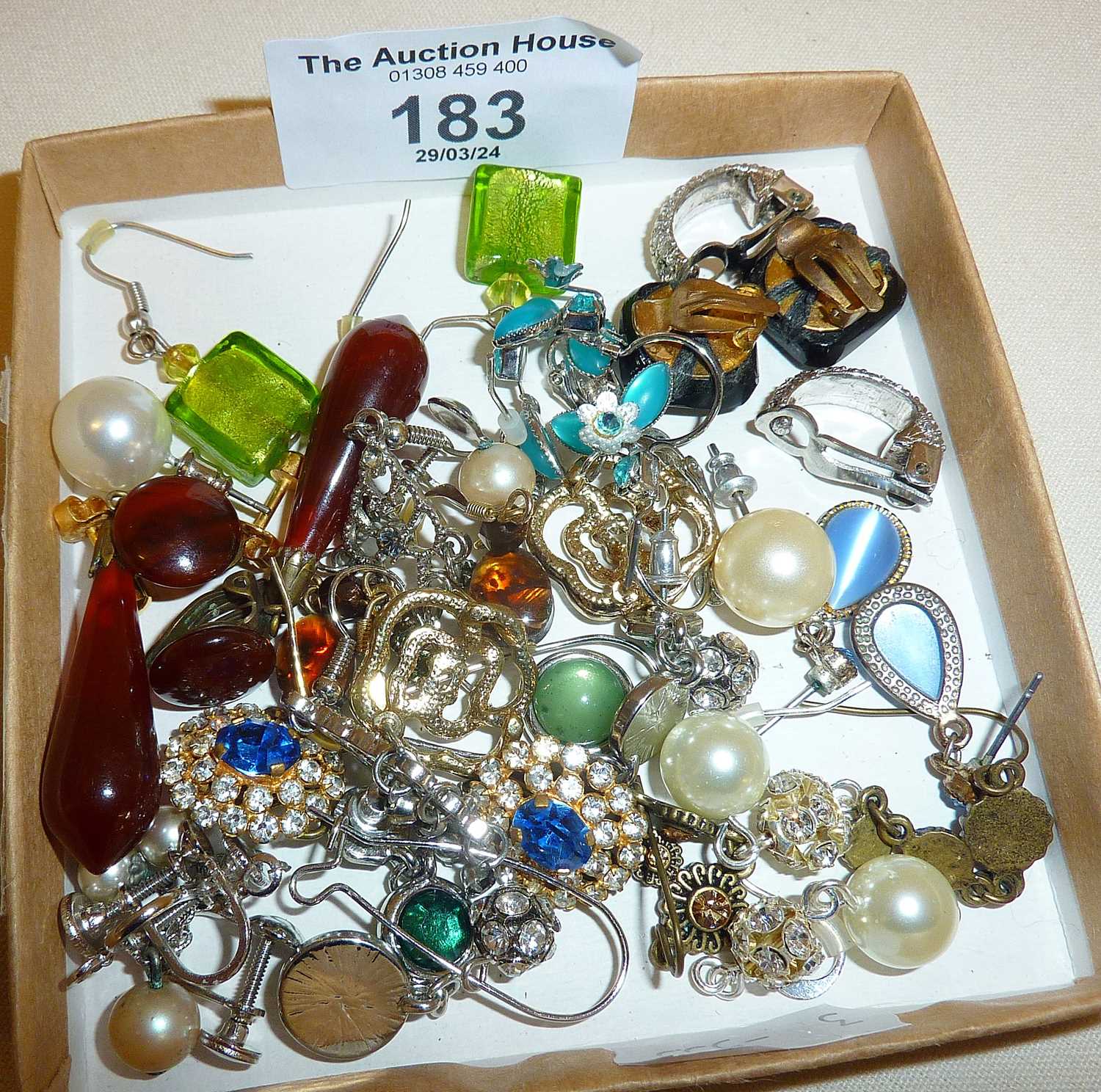 Various vintage and modern earrings
