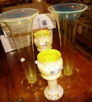 Pair of uranium glass trumpet vases and a pair of Victorian striated yellow glass vases