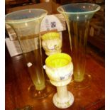 Pair of uranium glass trumpet vases and a pair of Victorian striated yellow glass vases