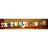 Collection of china, pottery and glass egg cups (14)
