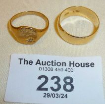 14ct gold band, approx. UK size N and weight 1.5g. Together with a 9ct gold signet ring, approx.