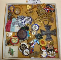 Vintage enamel and other badges, inc. a German Iron Cross medal