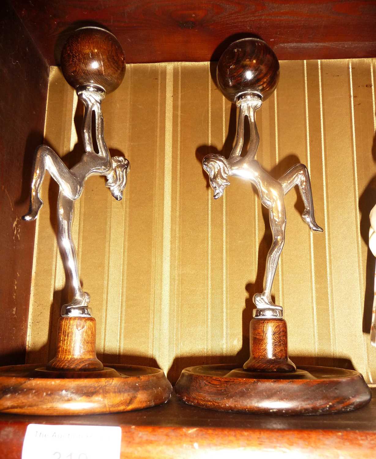 Pair of Art Deco chrome and turned wood lady candlesticks