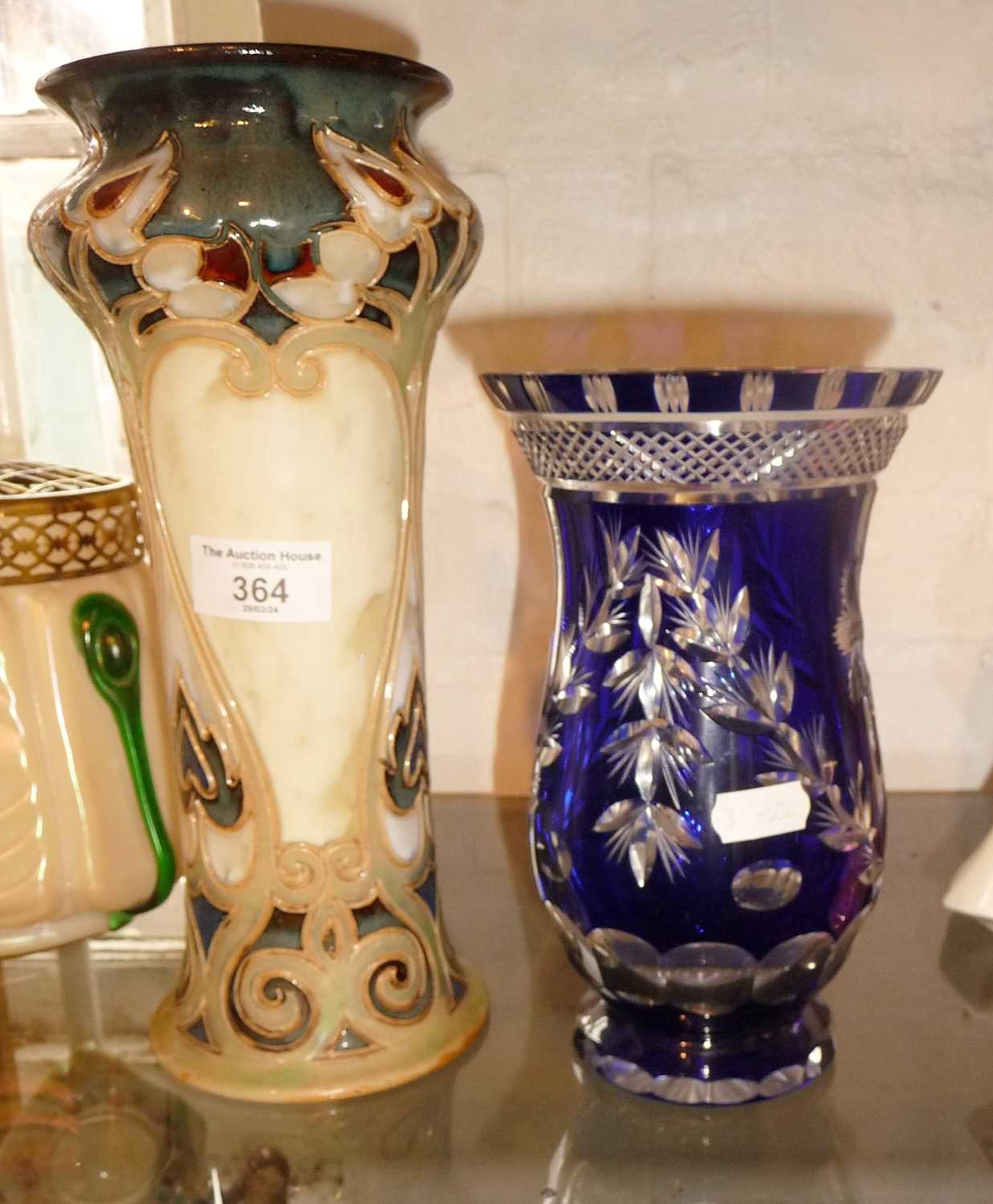 Royal Doulton Art Nouveau stoneware vase, 11" tall and a cut blue glass vase