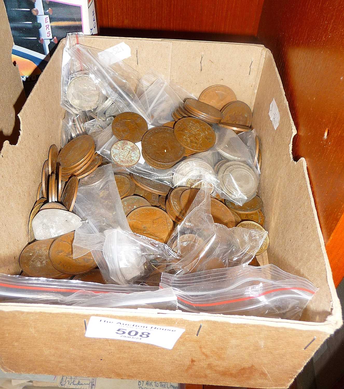 Box containing old coins