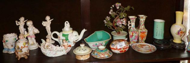 Oriental china items (many A/F), and some porcelain cherubs (one shelf)