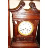 Victorian carved oak mantle clock with swan necked pediment having French movement striking on a