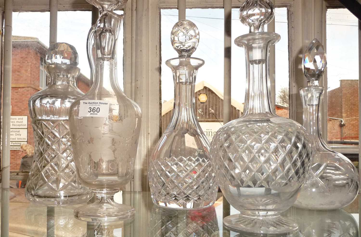 Etched glass claret jug on stemmed foot and four various cut glass decanters - Image 2 of 2