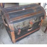 Victorian dome topped leather covered trunk, wood slats and brass lock