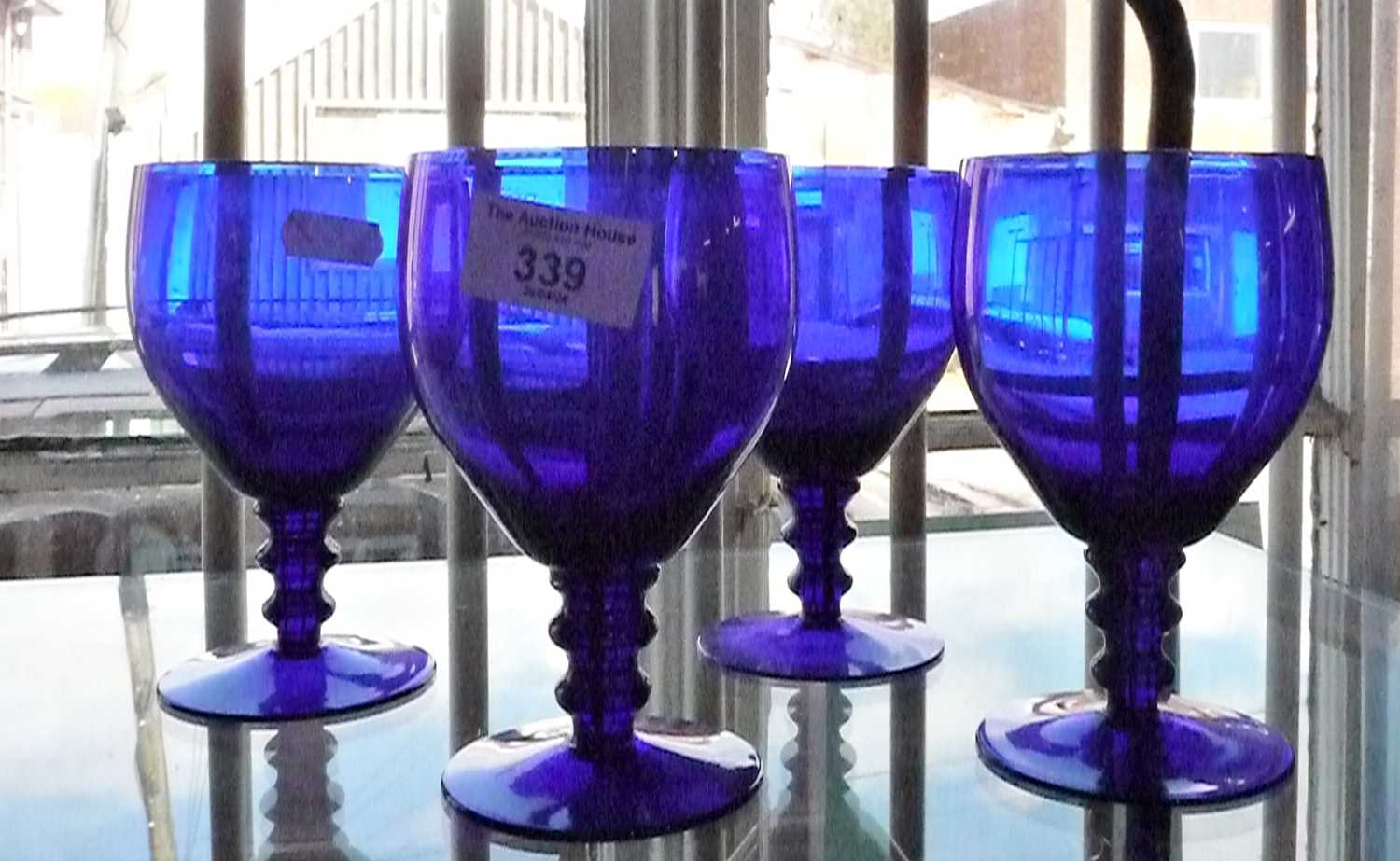 Four Bristol Blue glass goblets