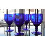 Four Bristol Blue glass goblets