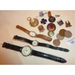 Wrist watches, coins and enamel badges