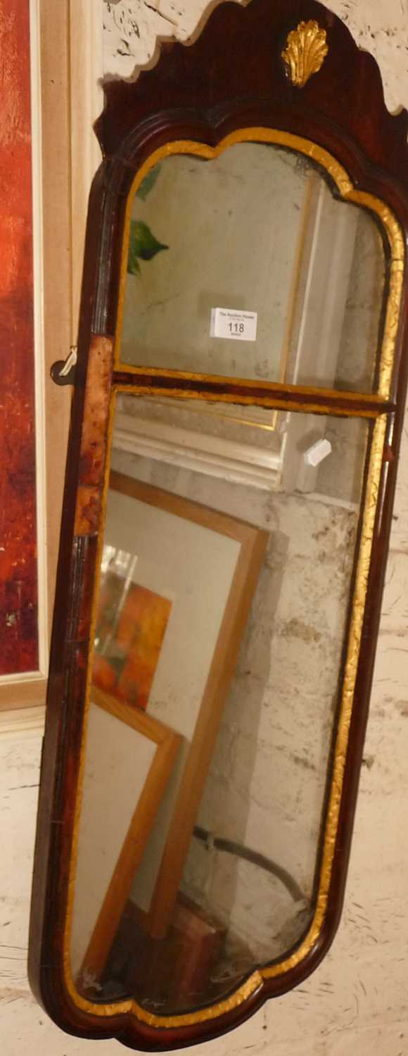 George II walnut pier mirror having shaped pediment and gilded shell carving, original glass