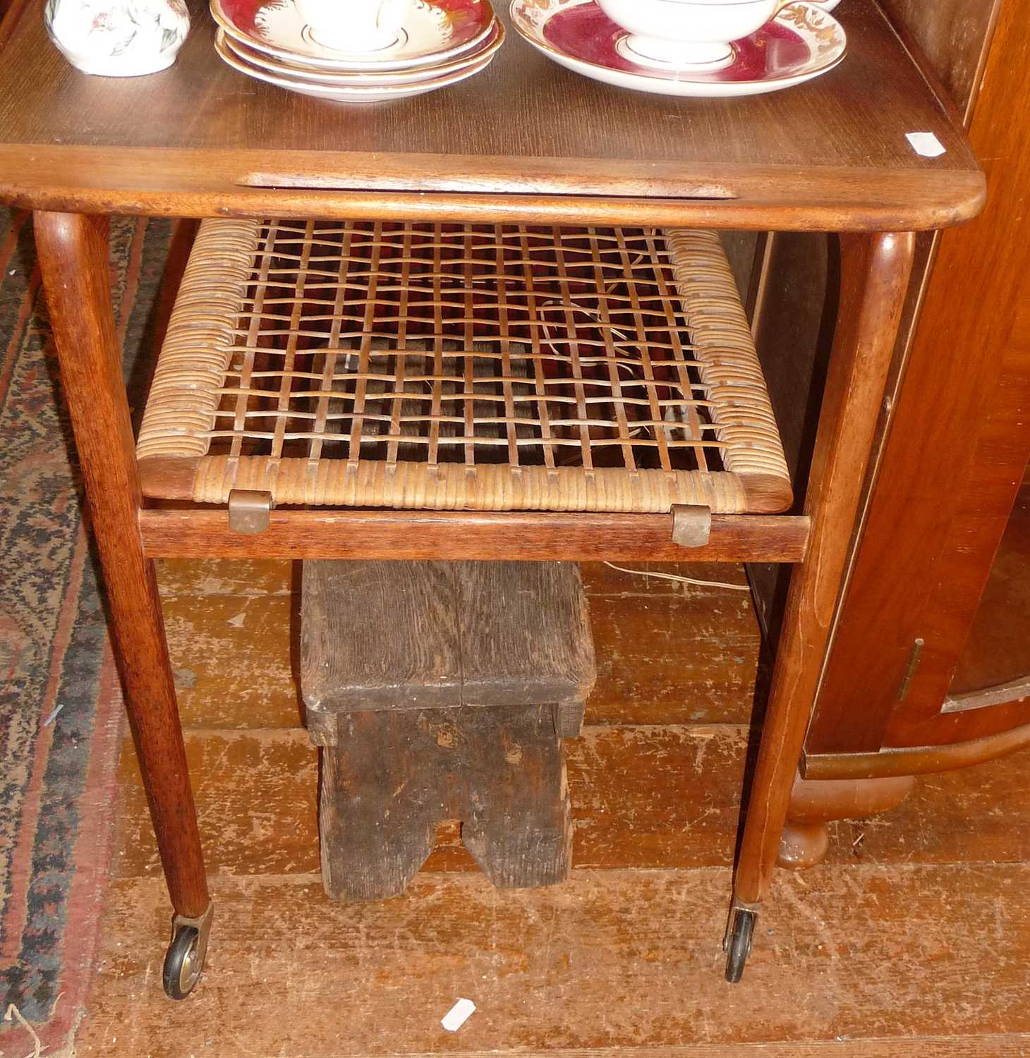 Mid-century Danish teak tea trolley by Johanes Anderson, having tray top above canework undertier