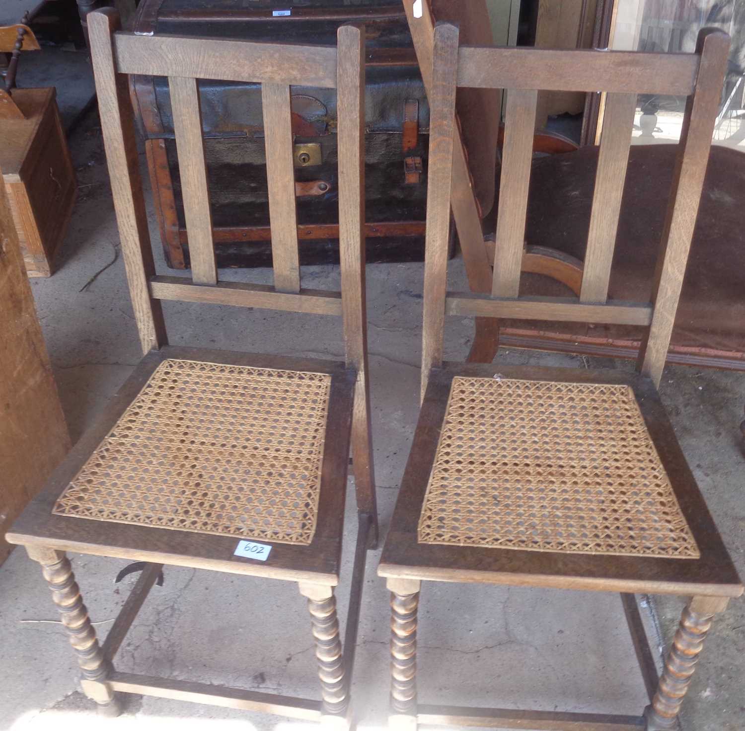 Pair of bobbin turned cane seated oak side chairs