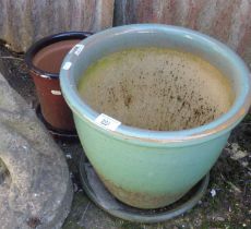 Two garden pots with trays