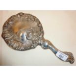 Edwardian Art Nouveau silver hand mirror with repousse water lily design. Hallmarked for