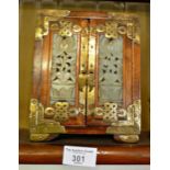 Chinese jewellery cabinet with brass mounts and jade inset doors enclosing three drawers, 18cm