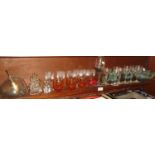 Shelf of etched wine glasses and other glassware