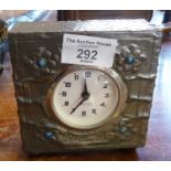 Arts and Crafts beaten pewter mantle clock case having later movement marked 'Mercedes'