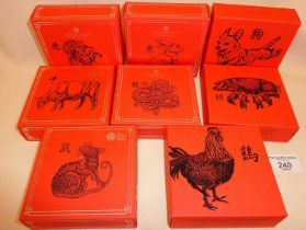 Set of eight Royal Mint half ounce boxed silver proof coins, representing different animals of the