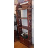 Mahogany shelving unit with drawers under